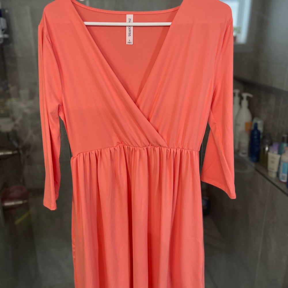 Bright coral midi dress. Not awkwardly long but not short either.